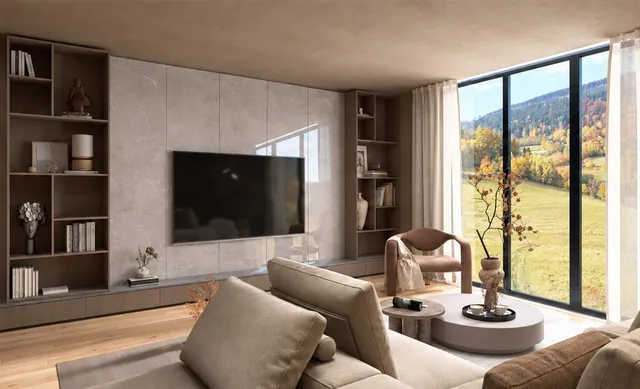 Wohnzimmer mit Steinwand, Holzregalen, Ecksofa und großem Fenster mit Blick auf herbstliche Hügel