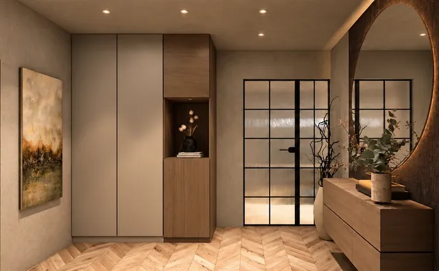 Garderobe mit Holzschrank, Kalkputzwänden, rundem beleuchtetem Spiegel und Riffelglas-Tür